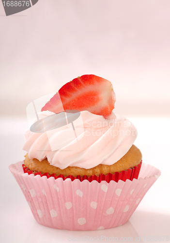 Image of Vanilla cupcake with stawberry frosting and strawberry