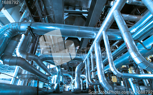 Image of Equipment, cables and piping as found inside of a modern industr