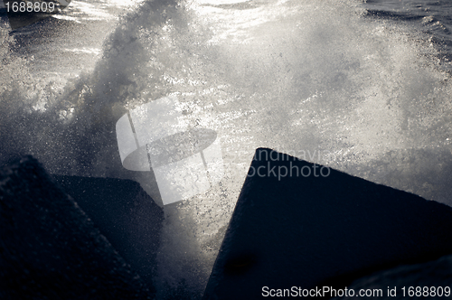 Image of Tidal wave with 2 concrete blocks