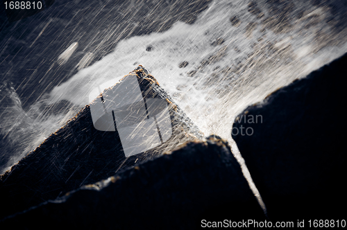 Image of Tidal wave with 3 concrete blocks