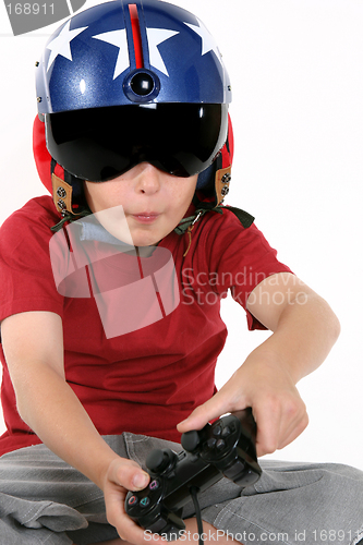 Image of Child in helmet playing a flight simulator