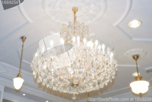 Image of chandelier hanging from ceiling