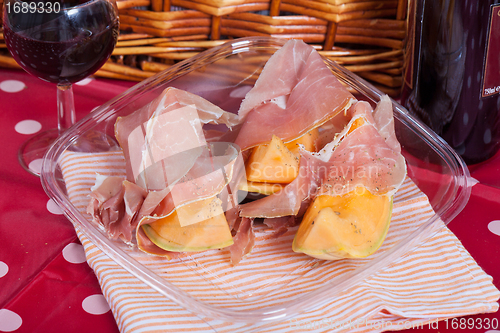 Image of Cantaloupe melon with italian ham