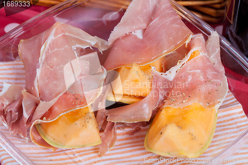 Image of Cantaloupe melon with italian ham