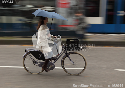 Image of Woman on bicycle