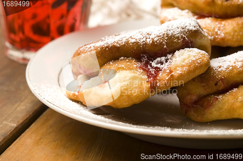 Image of Sweet doughnuts with rose marmelade