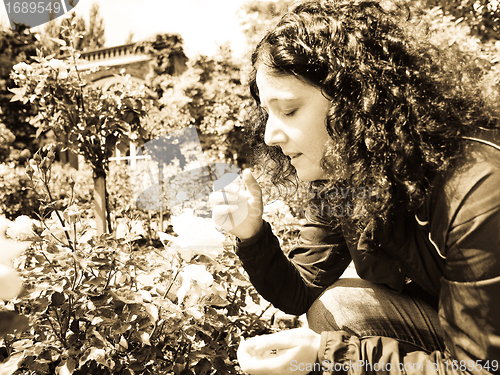 Image of Pretty brunette sneezing coughing