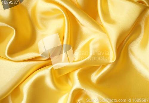 Image of Smooth elegant golden silk can use as background 
