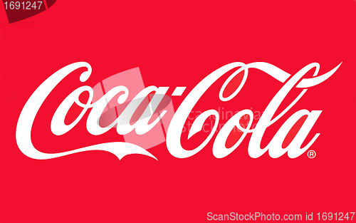 Image of A close up of the Coca-Cola logo on the red background