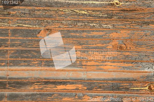 Image of Paint stripped off old factory door.
