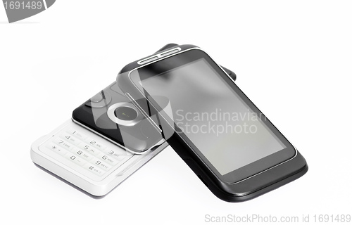 Image of old phone and new smartphone on white background