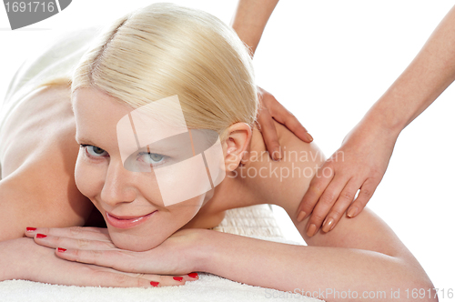 Image of Young sexy woman getting spa treatment