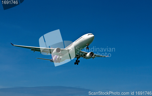 Image of plane with landing gear