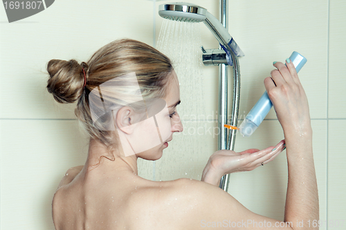 Image of woman is taking a shower and relaxing