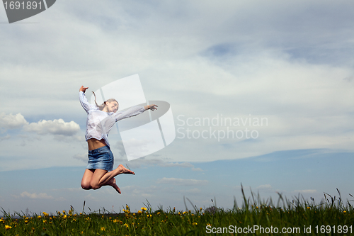 Image of young woman is happy outdoor in summer
