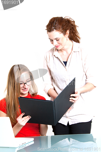 Image of two business woman are discussing about a problem at work