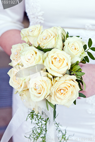Image of beautiful bridal bouquet of white roses