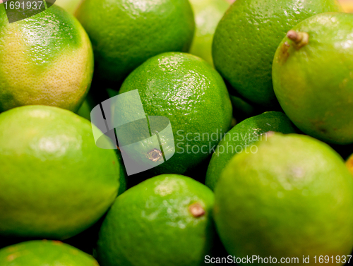 Image of fresh green limes closeup 