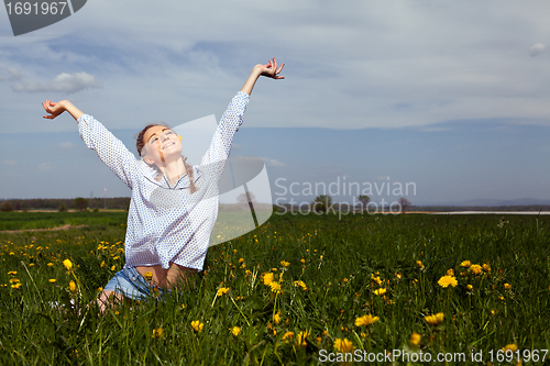 Image of smiling woman outdoor in summer 