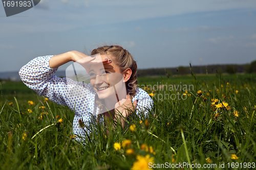 Image of smiling woman outdoor in summer 