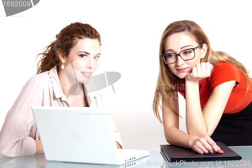 Image of two business woman are discussing about a problem at work