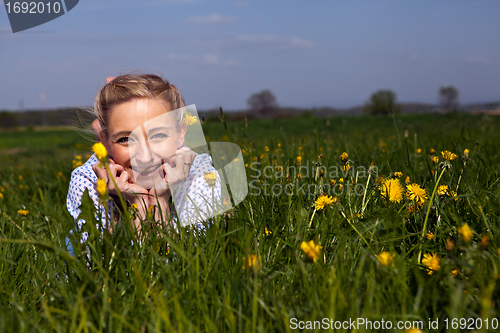 Image of smiling woman outdoor in summer 