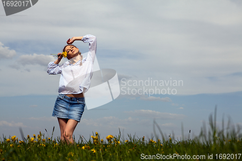 Image of young woman is happy outdoor in summer