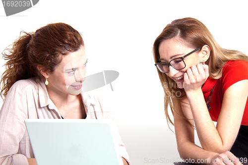 Image of two business woman are discussing about a problem at work