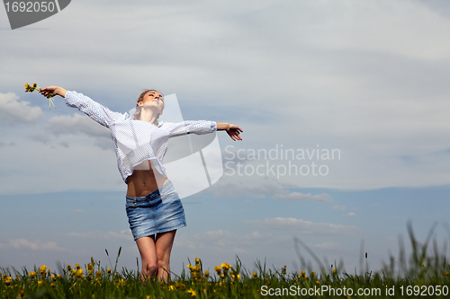 Image of young woman is happy outdoor in summer