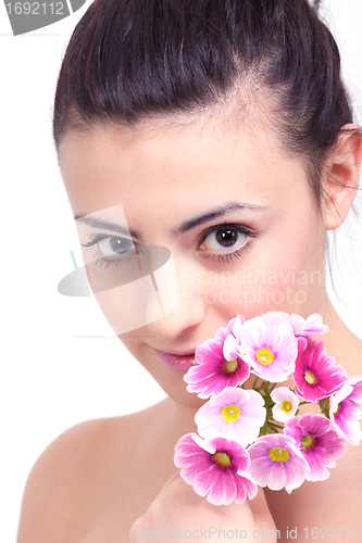Image of young beautiful brunette woman with flower