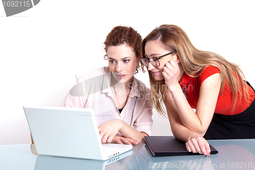 Image of two business woman are discussing about a problem at work