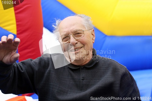 Image of Happy senior man on a colorful background