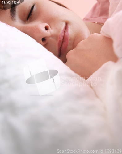 Image of Beautiful young woman sleeping.