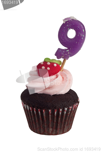 Image of Mini cupcake with birthday candle for nine year old