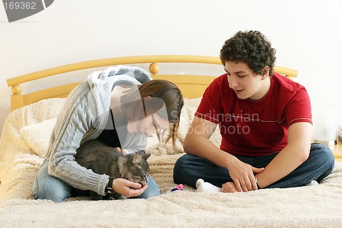 Image of Couple with a kitten