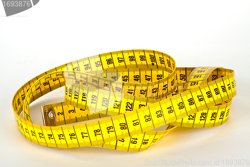 Image of yellow measure tape with scale in centimeters