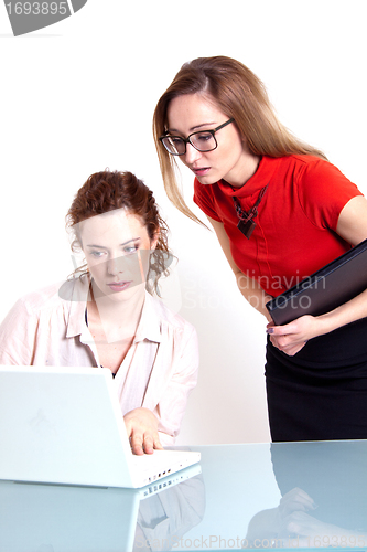 Image of two business woman are discussing about a problem at work