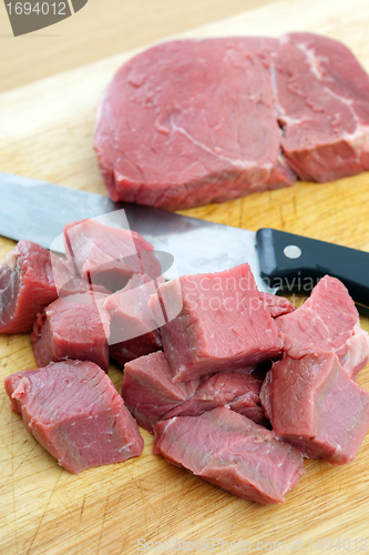 Image of Cutting beef into cubes