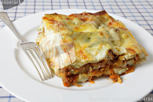 Image of Lasagne slice with fork