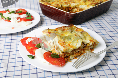 Image of Lasagne verde and caprese salad