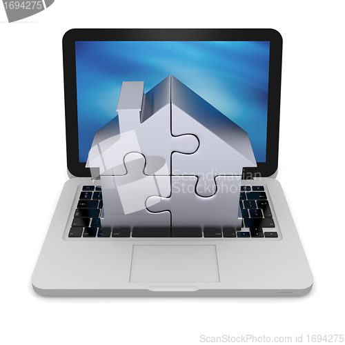 Image of Home jigsaw on laptop
