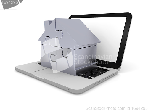 Image of Home jigsaw on laptop