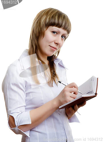 Image of young girl with a notebook