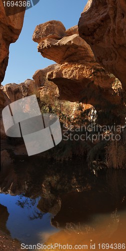 Image of Small pool at the bottom of the desert gorge 