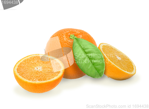 Image of Heap of fresh orange with green leaf
