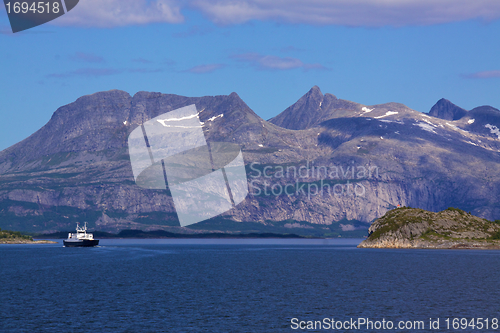 Image of Ferry passing through fjord