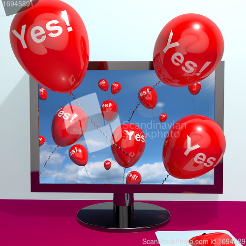 Image of Yes Balloons From A Computer Showing Approval And Support Messag