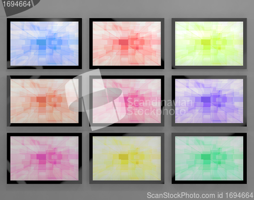 Image of TV Monitors Wall Mounted In Different Colors Representing High D