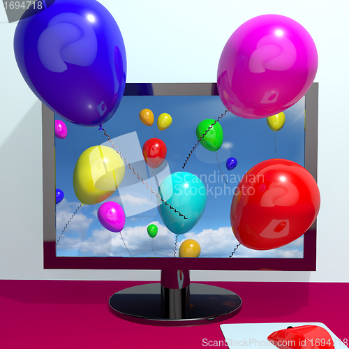 Image of Balloons In The Sky And Coming Out Of Screen For Online Greeting