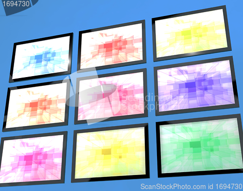 Image of Nine TV Monitors Wall Mounted In Different Colors Representing H